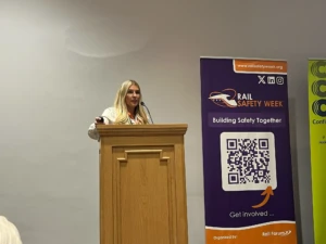 Someone presenting on a podium